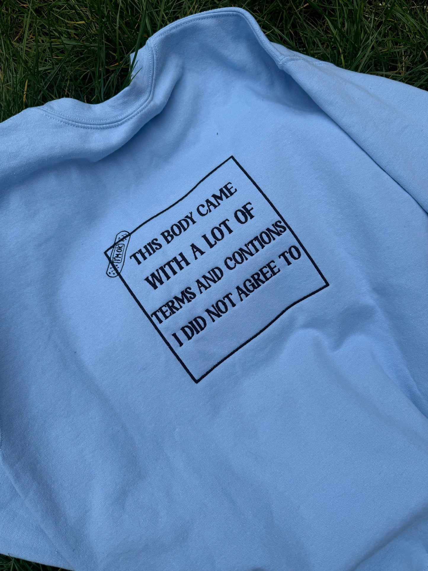 This body came with terms and conditions embroidered