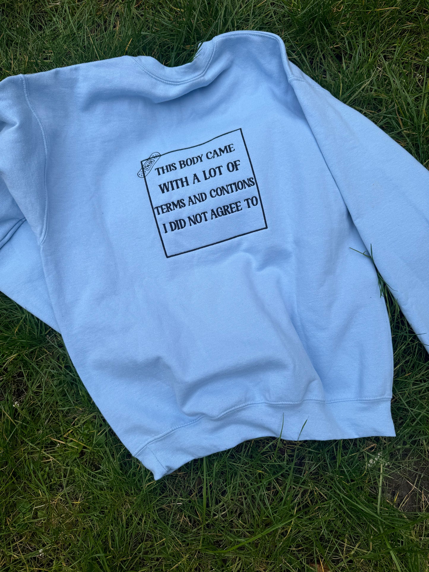 This body came with terms and conditions embroidered